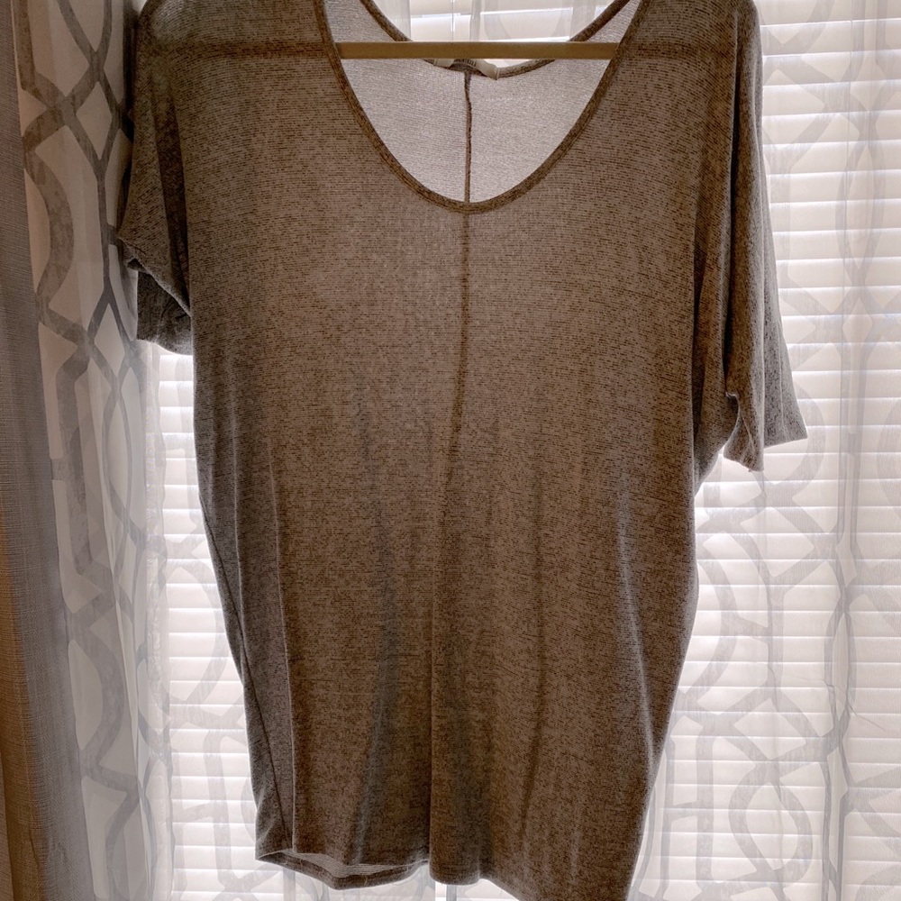 Gray shirt, very flattering.